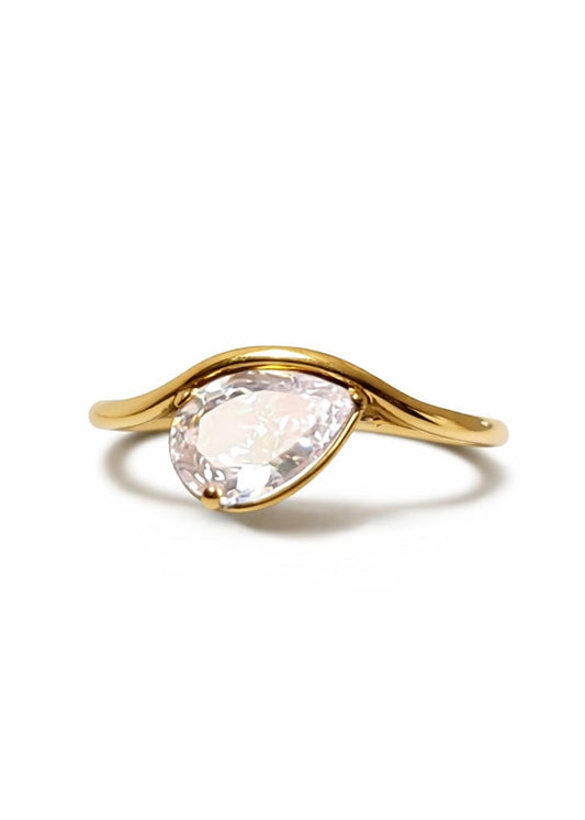 The Pear-Shaped Curved Ring