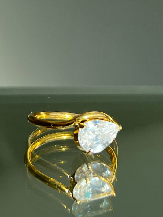 The Pear-Shaped Curved Ring